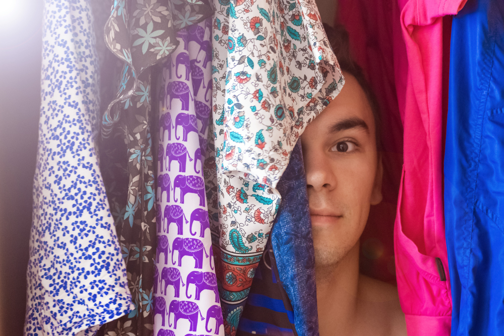 person hiding in closet