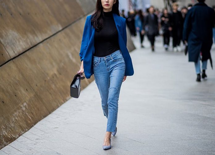 woman-wearing-jeans-black-turtleneck-and-blue-blazer