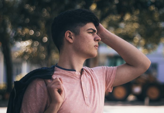photo-of-man-wearing-pink-shirt-2301212 1