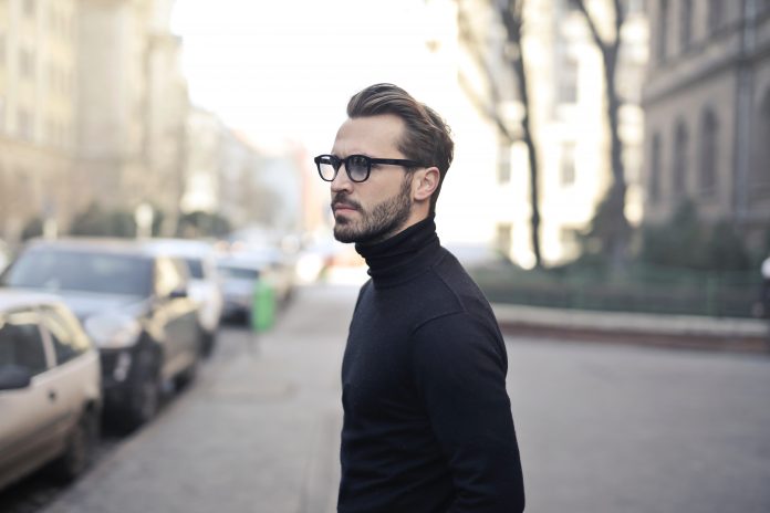 man-standing-on-street-839011