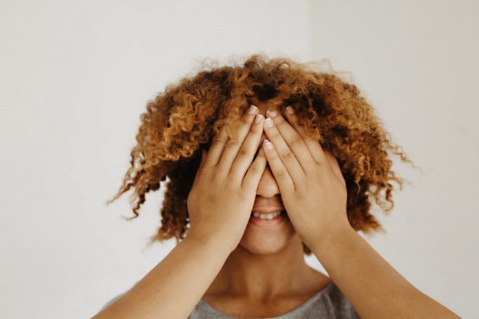 woman-covering-his-eyes-1588048
