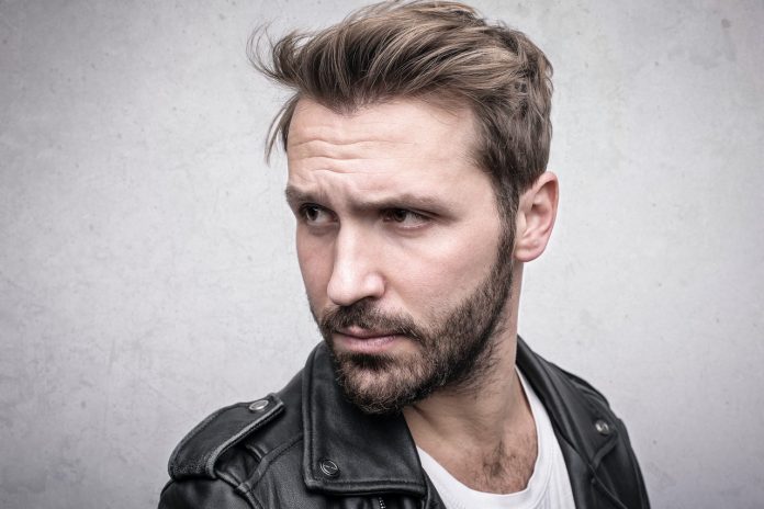 bearded-man-in-black-leather-jacket-3775534